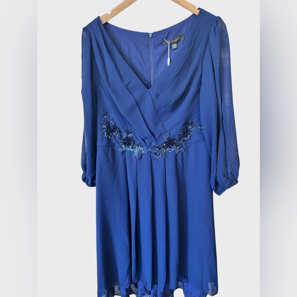 Ever pretty new with tag Royal Blue Long Sleeve Dress.